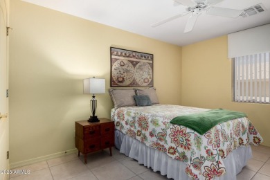 Enjoy the charm of this delightful 2-bedroom end-unit townhome! on Apache Wells Country Club in Arizona - for sale on GolfHomes.com, golf home, golf lot