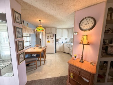 FULLY FURNISHED w/ a GOLF CART which has almost NEW tires and on Lone Palm Golf Club in Florida - for sale on GolfHomes.com, golf home, golf lot
