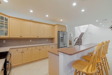 Beautifully maintained 4-bedroom, 2.5-bath home with a 2-car on The Links At Madison Green in Florida - for sale on GolfHomes.com, golf home, golf lot