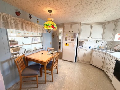 FULLY FURNISHED w/ a GOLF CART which has almost NEW tires and on Lone Palm Golf Club in Florida - for sale on GolfHomes.com, golf home, golf lot