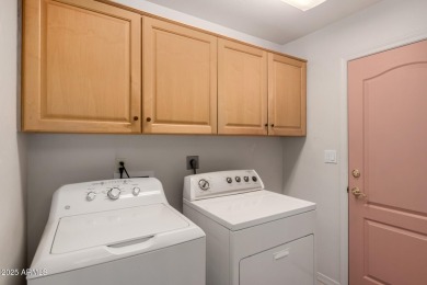 Enjoy the charm of this delightful 2-bedroom end-unit townhome! on Apache Wells Country Club in Arizona - for sale on GolfHomes.com, golf home, golf lot