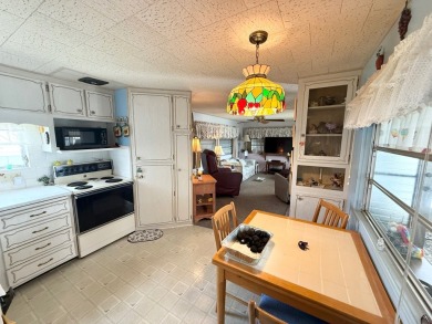 FULLY FURNISHED w/ a GOLF CART which has almost NEW tires and on Lone Palm Golf Club in Florida - for sale on GolfHomes.com, golf home, golf lot
