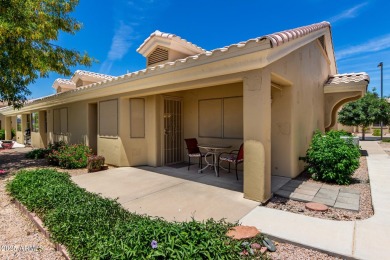Enjoy the charm of this delightful 2-bedroom end-unit townhome! on Apache Wells Country Club in Arizona - for sale on GolfHomes.com, golf home, golf lot
