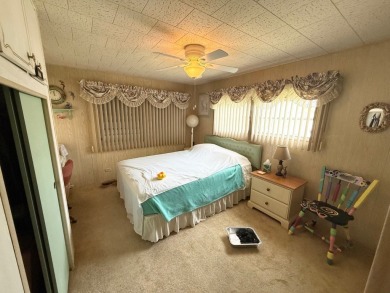 FULLY FURNISHED w/ a GOLF CART which has almost NEW tires and on Lone Palm Golf Club in Florida - for sale on GolfHomes.com, golf home, golf lot