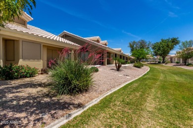 Enjoy the charm of this delightful 2-bedroom end-unit townhome! on Apache Wells Country Club in Arizona - for sale on GolfHomes.com, golf home, golf lot