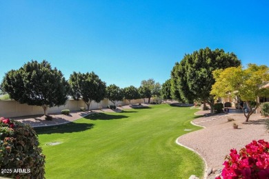 Enjoy the charm of this delightful 2-bedroom end-unit townhome! on Apache Wells Country Club in Arizona - for sale on GolfHomes.com, golf home, golf lot