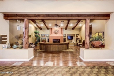 Enjoy the charm of this delightful 2-bedroom end-unit townhome! on Apache Wells Country Club in Arizona - for sale on GolfHomes.com, golf home, golf lot
