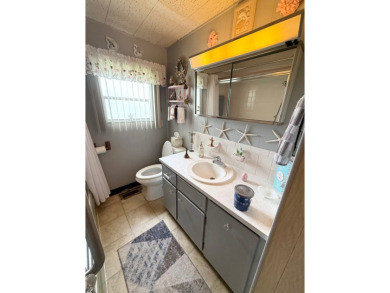 FULLY FURNISHED w/ a GOLF CART which has almost NEW tires and on Lone Palm Golf Club in Florida - for sale on GolfHomes.com, golf home, golf lot
