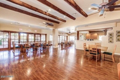 Enjoy the charm of this delightful 2-bedroom end-unit townhome! on Apache Wells Country Club in Arizona - for sale on GolfHomes.com, golf home, golf lot