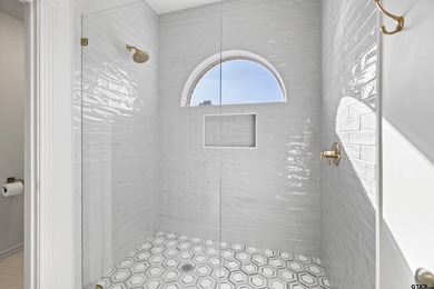 Welcome to your new sanctuary of luxury, situated within the on Hollytree Country Club in Texas - for sale on GolfHomes.com, golf home, golf lot