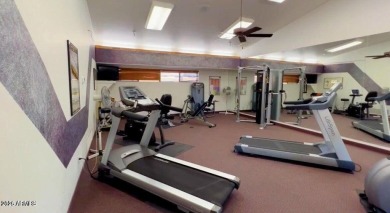 Enjoy the charm of this delightful 2-bedroom end-unit townhome! on Apache Wells Country Club in Arizona - for sale on GolfHomes.com, golf home, golf lot