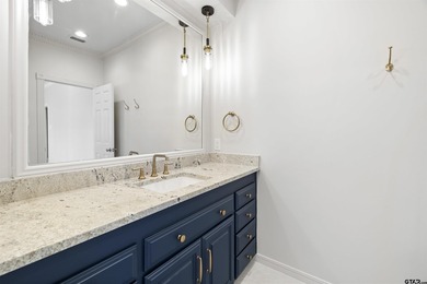 Welcome to your new sanctuary of luxury, situated within the on Hollytree Country Club in Texas - for sale on GolfHomes.com, golf home, golf lot