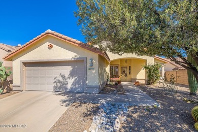 Located in the golf community of Tucson National, this 2BD/2BA on Omni Tucson National Golf Resort and Spa - Sonoran in Arizona - for sale on GolfHomes.com, golf home, golf lot