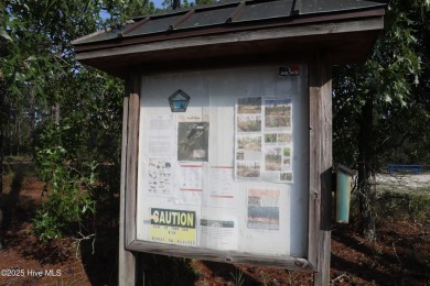 1.02-acre wooded lot in Boiling Spring Lakes, offering a on The Lakes Country Club in North Carolina - for sale on GolfHomes.com, golf home, golf lot
