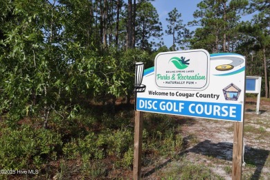 1.02-acre wooded lot in Boiling Spring Lakes, offering a on The Lakes Country Club in North Carolina - for sale on GolfHomes.com, golf home, golf lot