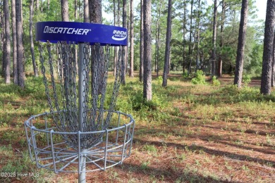 1.02-acre wooded lot in Boiling Spring Lakes, offering a on The Lakes Country Club in North Carolina - for sale on GolfHomes.com, golf home, golf lot