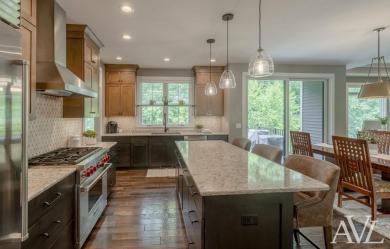 Welcome to this stunning custom-built stand-alone condo, located on Thousand Oaks Golf Club in Michigan - for sale on GolfHomes.com, golf home, golf lot