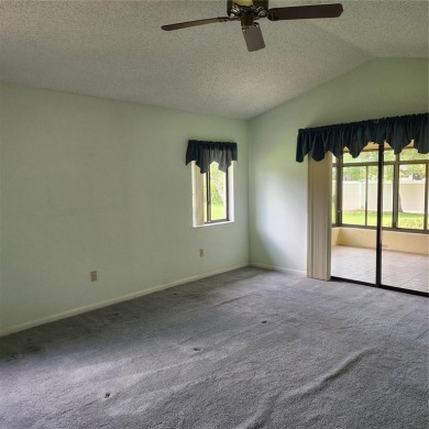 This meticulously maintained one owner home offers over 2,900 on The Grand Club - Pine Lakes Course in Florida - for sale on GolfHomes.com, golf home, golf lot