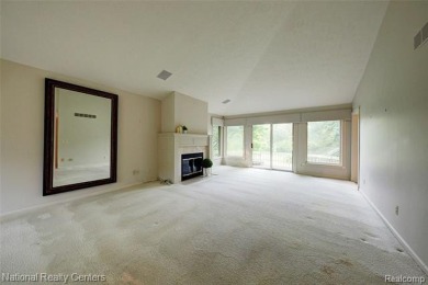 Welcome to 2692 Mulligan, a serene retreat nestled along Hole 7 on Country Club of Jackson in Michigan - for sale on GolfHomes.com, golf home, golf lot