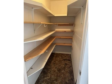 Discover this 3 bedroom, 2 bathroom home nestled on a on Hide-A-Way Lake Golf Course in Texas - for sale on GolfHomes.com, golf home, golf lot