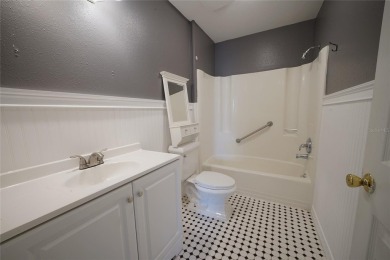 Across the street from a golf course, just off Hunter's Lake on Oak Hills Country Club in Florida - for sale on GolfHomes.com, golf home, golf lot