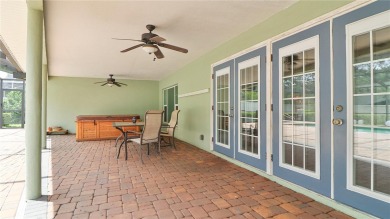 Imagine yourself living in this beautiful pool home in the heart on Bayou Golf Club in Florida - for sale on GolfHomes.com, golf home, golf lot