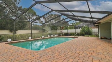 Imagine yourself living in this beautiful pool home in the heart on Bayou Golf Club in Florida - for sale on GolfHomes.com, golf home, golf lot