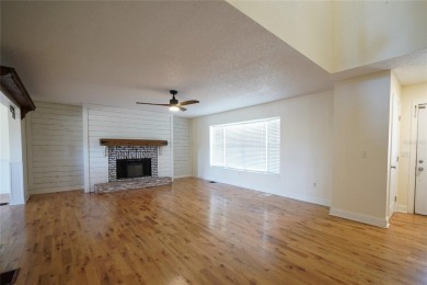 Across the street from a golf course, just off Hunter's Lake on Oak Hills Country Club in Florida - for sale on GolfHomes.com, golf home, golf lot