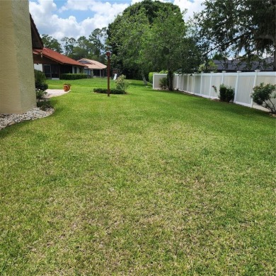 This meticulously maintained one owner home offers over 2,900 on The Grand Club - Pine Lakes Course in Florida - for sale on GolfHomes.com, golf home, golf lot