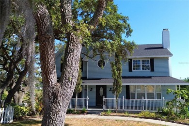 Across the street from a golf course, just off Hunter's Lake on Oak Hills Country Club in Florida - for sale on GolfHomes.com, golf home, golf lot