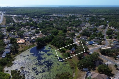 Across the street from a golf course, just off Hunter's Lake on Oak Hills Country Club in Florida - for sale on GolfHomes.com, golf home, golf lot