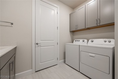 Stunning pool home with peaceful lanai retreat nestled in the on River Hall Country Club in Florida - for sale on GolfHomes.com, golf home, golf lot