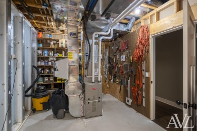 Welcome to this stunning custom-built stand-alone condo, located on Thousand Oaks Golf Club in Michigan - for sale on GolfHomes.com, golf home, golf lot