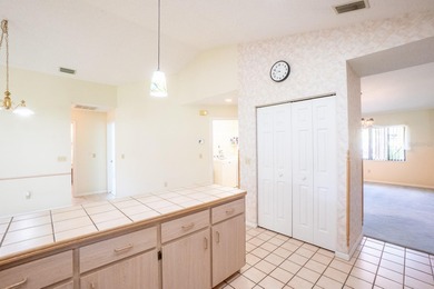 Under contract-accepting backup offerse home for the holidays! on The Grand Club - Pine Lakes Course in Florida - for sale on GolfHomes.com, golf home, golf lot