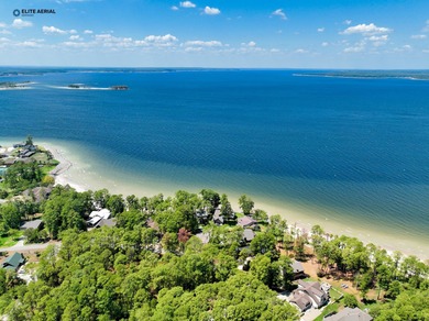 Nestled in the highly sought-after waterfront section of Rayburn on Rayburn Country Club in Texas - for sale on GolfHomes.com, golf home, golf lot