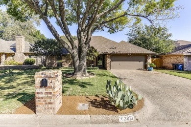 This charming three-bedroom brick home features a two-car garage on Lost Creek Golf Course in Texas - for sale on GolfHomes.com, golf home, golf lot