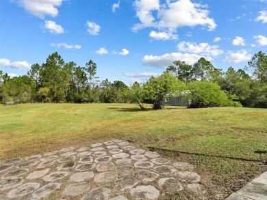 Under contract-accepting backup offers. Set on over an acre in on Wedgefield Golf Club in Florida - for sale on GolfHomes.com, golf home, golf lot