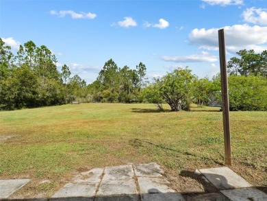 Under contract-accepting backup offers. Set on over an acre in on Wedgefield Golf Club in Florida - for sale on GolfHomes.com, golf home, golf lot