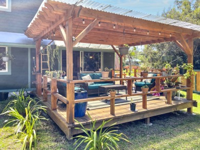 Situated in the lush serenity of Volcano Golf Course on Volcano Golf and Country Club in Hawaii - for sale on GolfHomes.com, golf home, golf lot