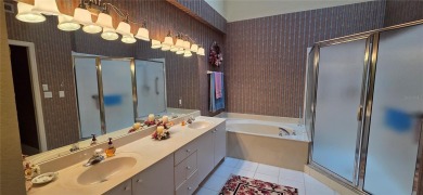 This stunning home is nestled in the gated community of Forest on Innisbrook Resort and Golf Club in Florida - for sale on GolfHomes.com, golf home, golf lot