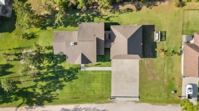 Welcome to 135 Brushwood--a custom-built retreat at Lake Sam on Rayburn Country Club in Texas - for sale on GolfHomes.com, golf home, golf lot