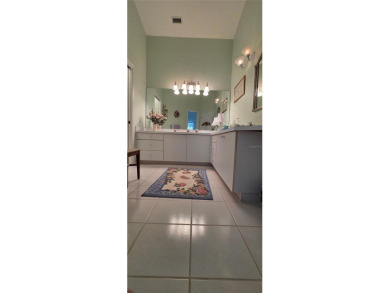 This stunning home is nestled in the gated community of Forest on Innisbrook Resort and Golf Club in Florida - for sale on GolfHomes.com, golf home, golf lot