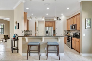 Under contract-accepting backup offers. Discover refined living on Eagle Creek Golf Club in Florida - for sale on GolfHomes.com, golf home, golf lot