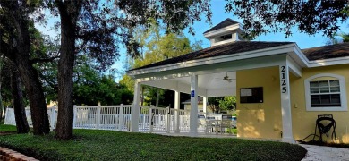 This stunning home is nestled in the gated community of Forest on Innisbrook Resort and Golf Club in Florida - for sale on GolfHomes.com, golf home, golf lot