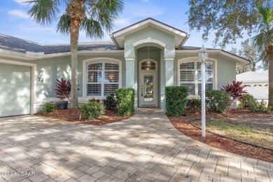 You've found the Florida Lifestyle home you were looking for! on Plantation Bay Golf and Country Club in Florida - for sale on GolfHomes.com, golf home, golf lot