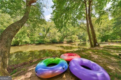 Riverfront living at itCOs finest with 110 feet of river on White Path Golf Club in Georgia - for sale on GolfHomes.com, golf home, golf lot