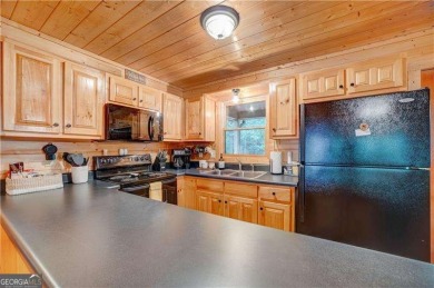Riverfront living at itCOs finest with 110 feet of river on White Path Golf Club in Georgia - for sale on GolfHomes.com, golf home, golf lot