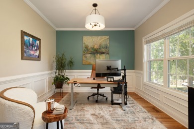 Price to move, this custom-built home sits on a roundabout on Hampton Golf Village in Georgia - for sale on GolfHomes.com, golf home, golf lot
