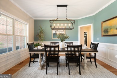 Price to move, this custom-built home sits on a roundabout on Hampton Golf Village in Georgia - for sale on GolfHomes.com, golf home, golf lot