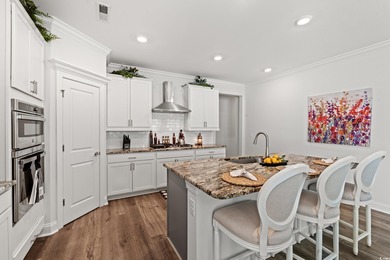 Live like you're on vacation every day in this impressive on Surf Golf and Beach Club in South Carolina - for sale on GolfHomes.com, golf home, golf lot